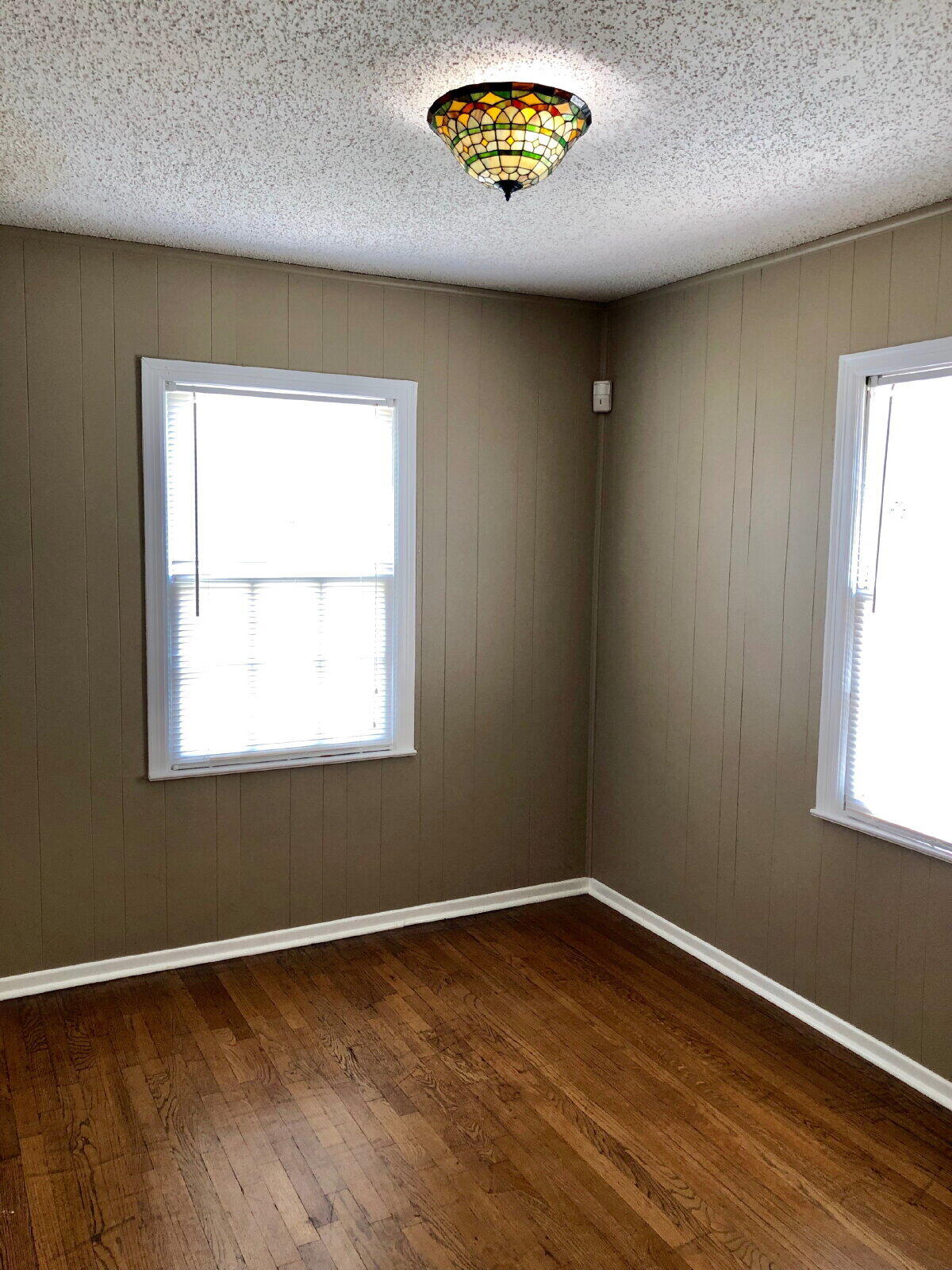 3412 30th Street Lubbock, TX 79410 - Photo 10 of 14 an empty room with a window