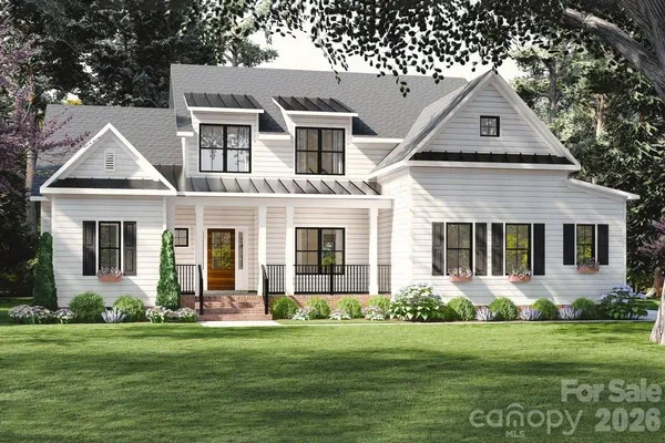 front view of a house with a yard