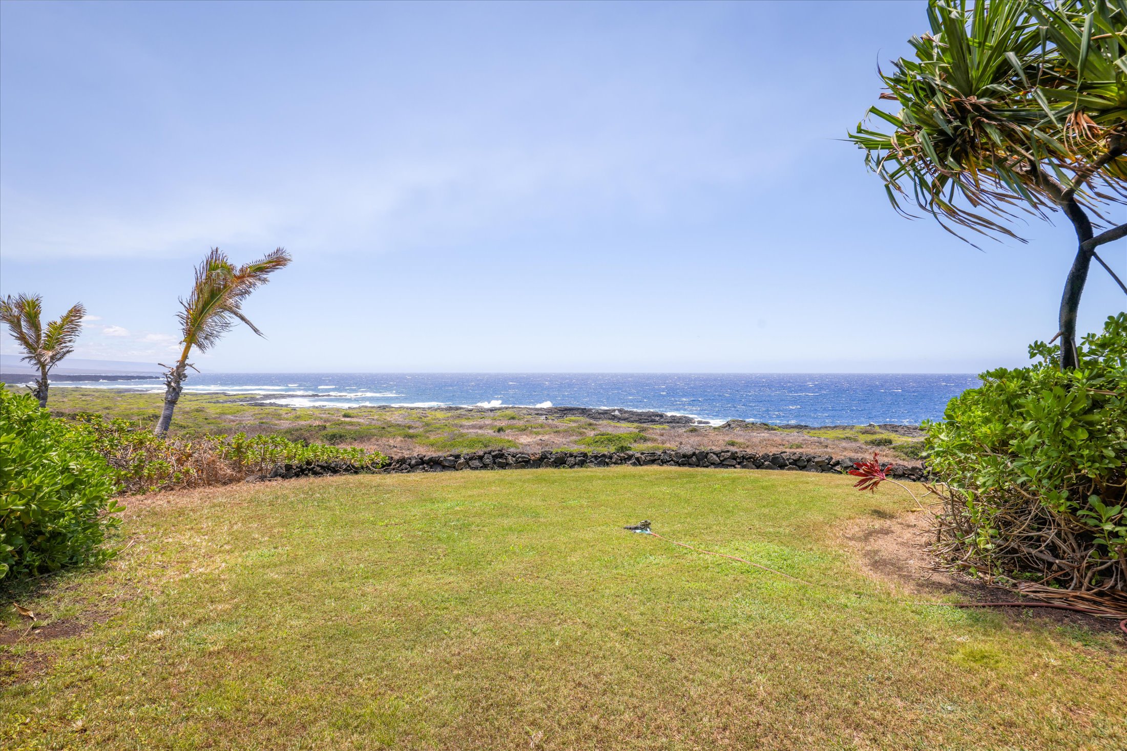 95-4667 Hawaii Belt Road Naalehu, HI 96772 - Photo 4 of 30 a view of an ocean and beach