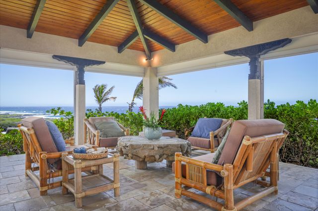 a couple of chairs in a patio