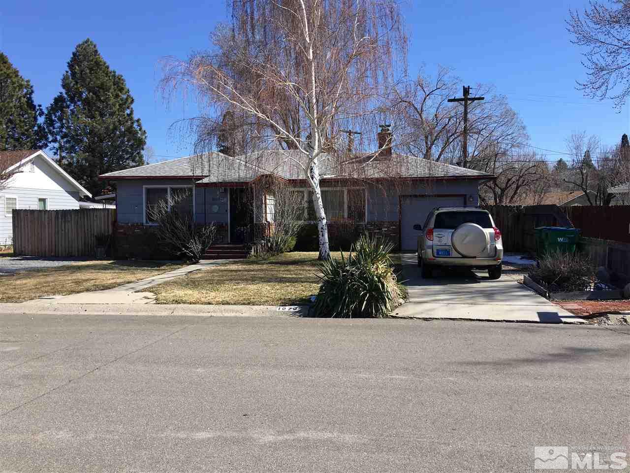 1070 Memory Lane Reno, NV 89509 - Photo 1 of 1 a view of a house with a yard