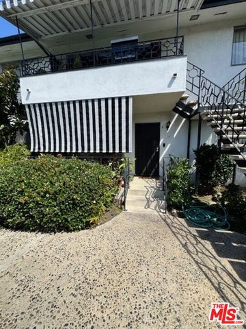 a view of a backyard of a house