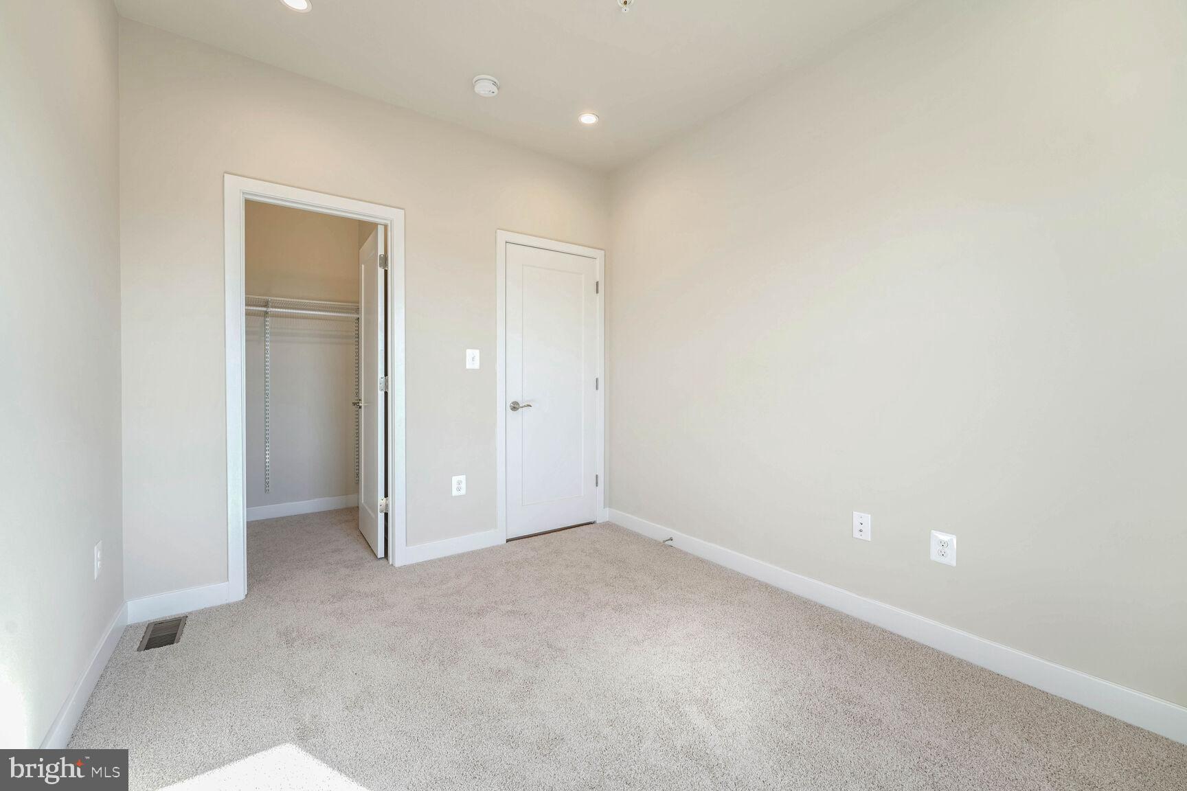 2514 Elvans Road Southeast Washington, DC 20020 - Photo 11 of 25 an empty room with closet area