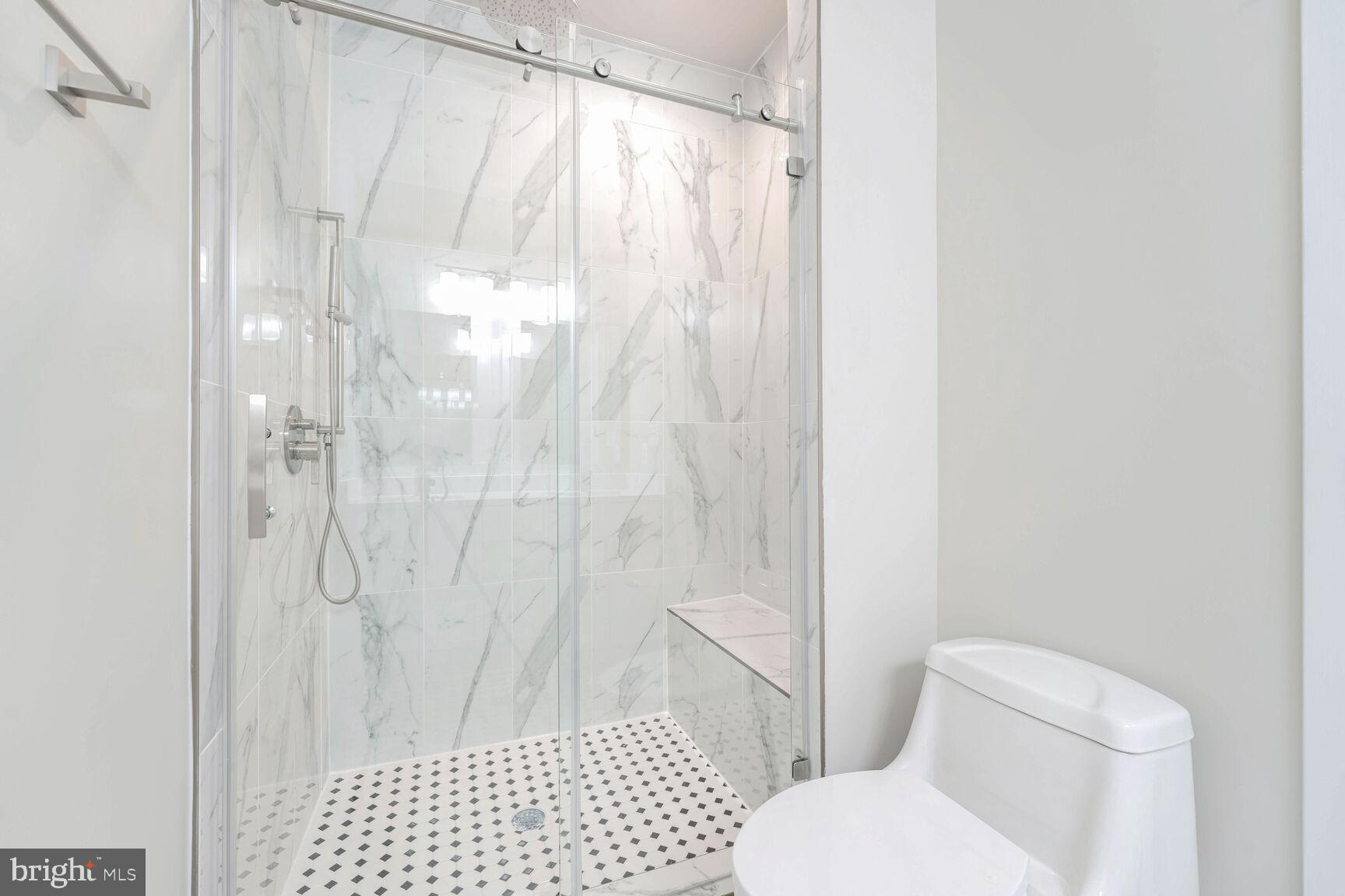2514 Elvans Road Southeast Washington, DC 20020 - Photo 17 of 25 a bathroom with a toilet and shower