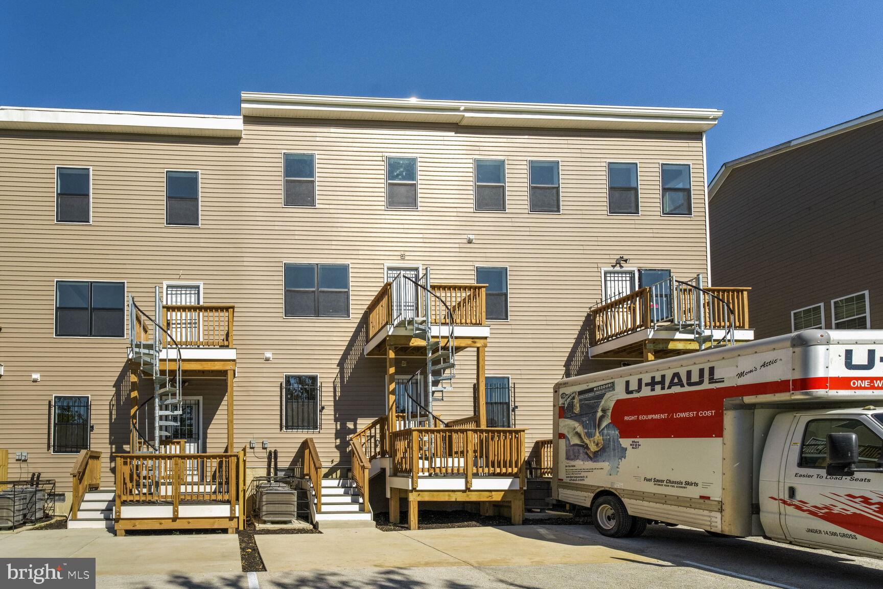 2514 Elvans Road Southeast Washington, DC 20020 - Photo 20 of 25 a view of a building with cars