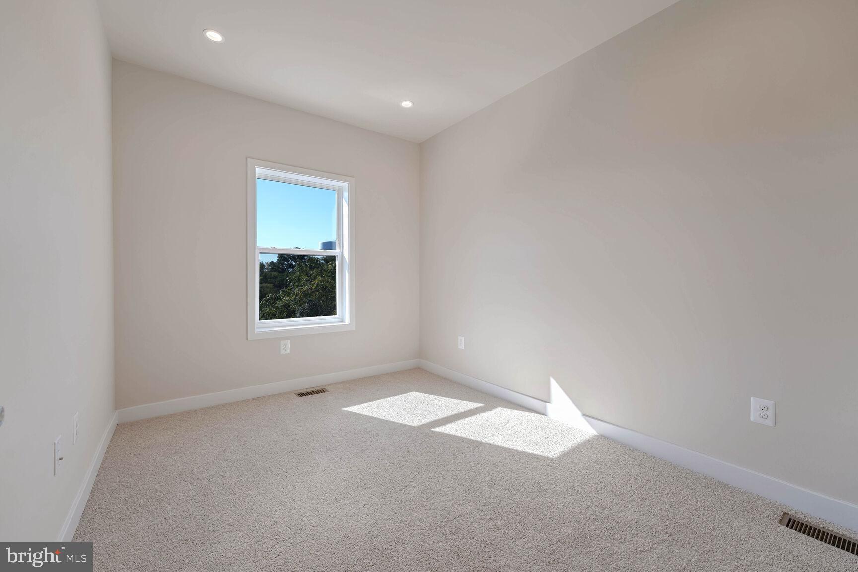 2514 Elvans Road Southeast Washington, DC 20020 - Photo 10 of 25 an empty room with windows