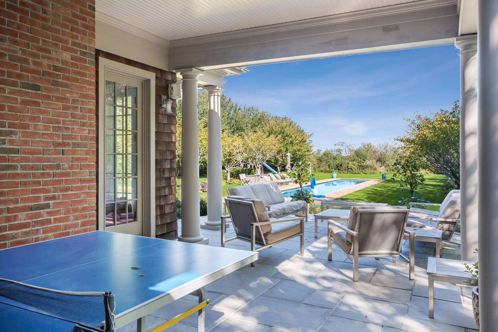 25 Jordan Drive Water Mill, NY 11976 - Photo 14 of 43 a view of a patio with a table and chairs
