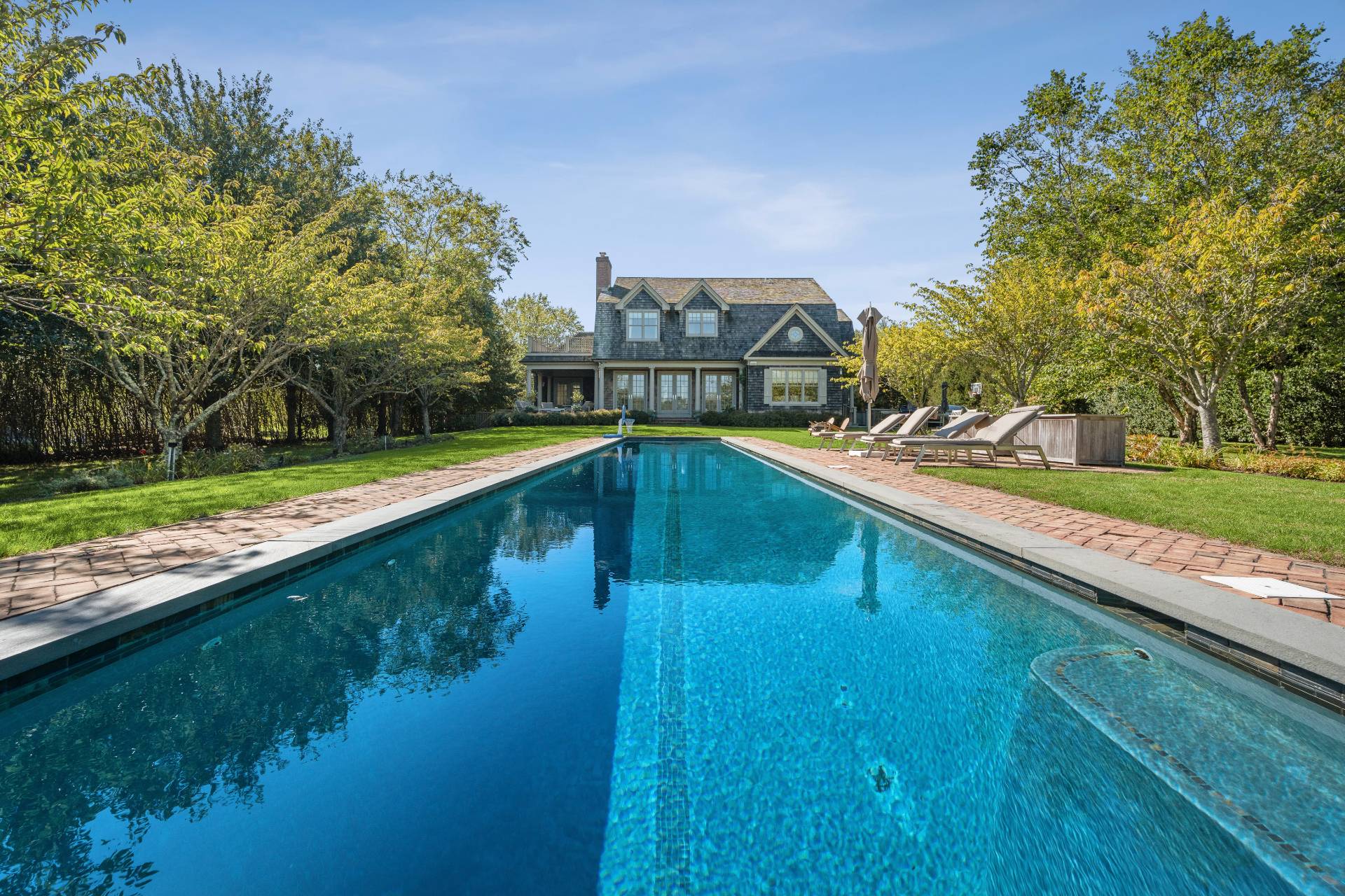 25 Jordan Drive Water Mill, NY 11976 - Photo 2 of 43 a view of a swimming pool with a yard