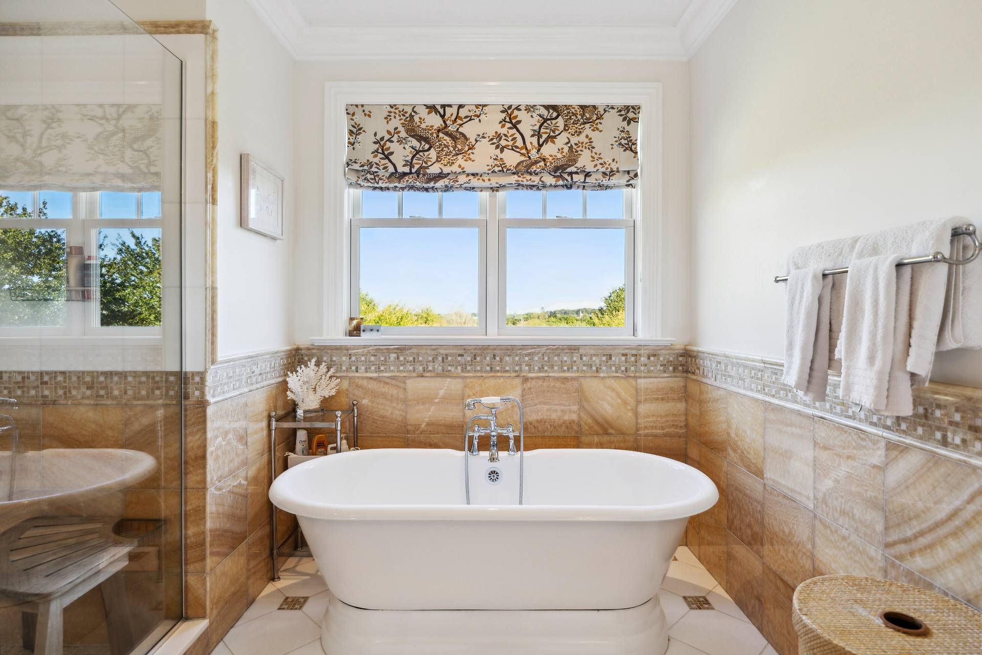 25 Jordan Drive Water Mill, NY 11976 - Photo 23 of 43 a bathroom with a sink a bathtub and a window