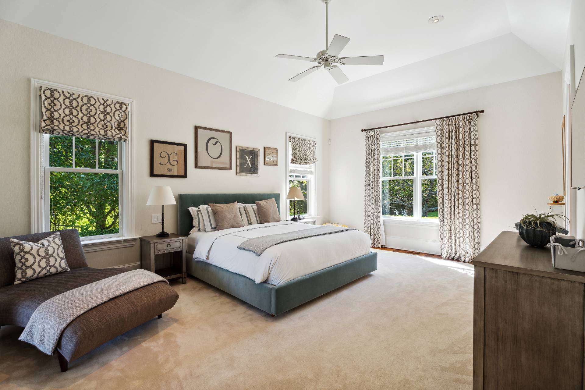 25 Jordan Drive Water Mill, NY 11976 - Photo 24 of 43 a spacious bedroom with a bed and glass window