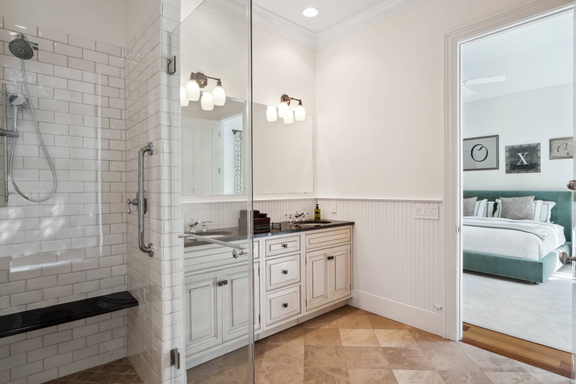 25 Jordan Drive Water Mill, NY 11976 - Photo 26 of 43 a spacious bathroom with a double vanity sink a mirror and a shower