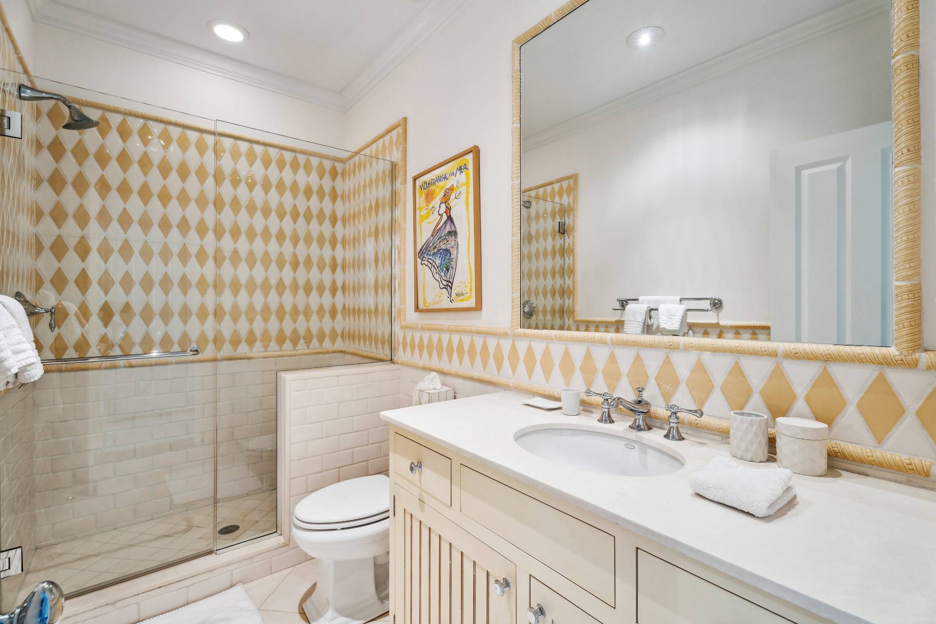 25 Jordan Drive Water Mill, NY 11976 - Photo 29 of 43 a bathroom with a sink a toilet and shower curtain