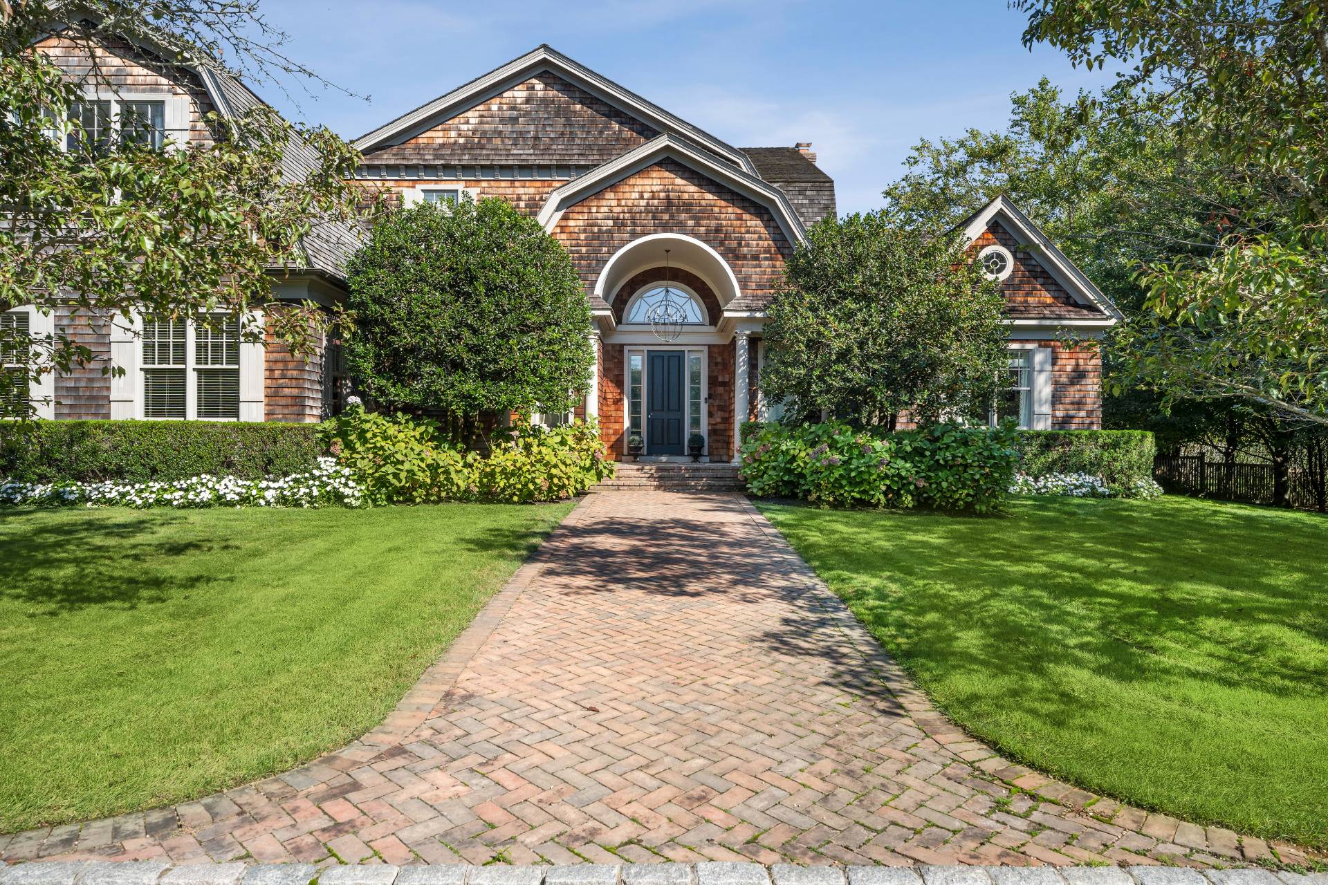 25 Jordan Drive Water Mill, NY 11976 - Photo 5 of 43 a front view of a house with garden