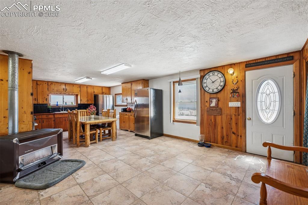 6771 Boone Road Boone, CO 81025 - Photo 12 of 49 a view of a livingroom with furniture and a stove