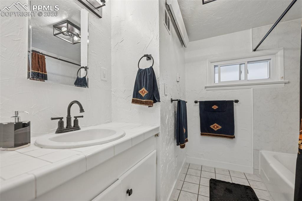 6771 Boone Road Boone, CO 81025 - Photo 22 of 49 a bathroom with a sink and a mirror