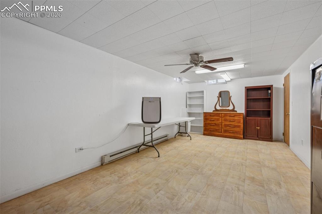 6771 Boone Road Boone, CO 81025 - Photo 23 of 49 a view of a livingroom with furniture and a ceiling fan