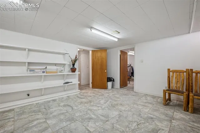 a view of a house with a snow in the yard