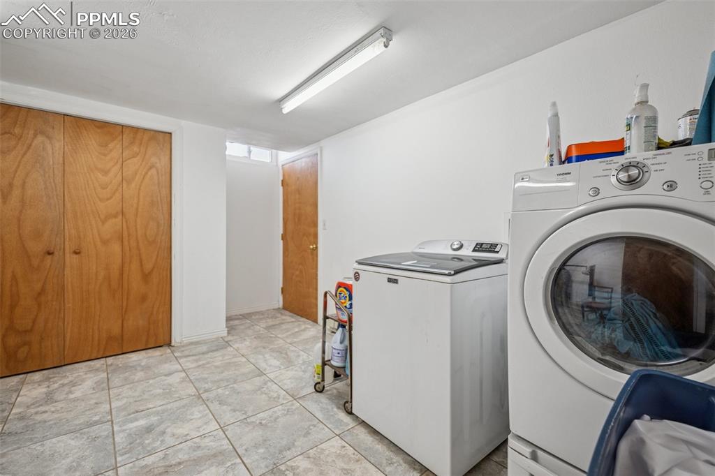 6771 Boone Road Boone, CO 81025 - Photo 26 of 49 a view of a storage & utility room with washer and dryer