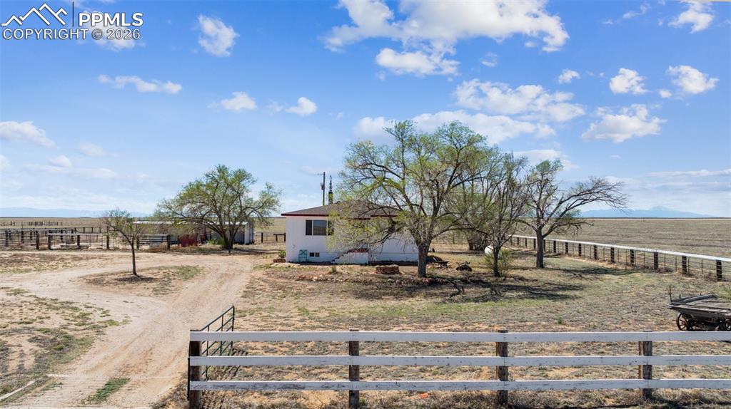 6771 Boone Road Boone, CO 81025 - Photo 37 of 49 a view of a dry yard with trees