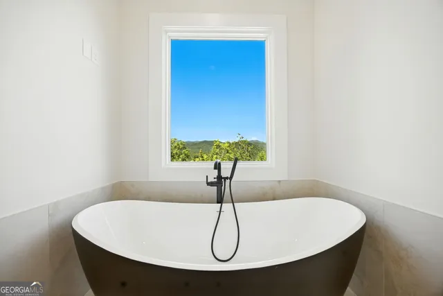 a view of a house with a mountain