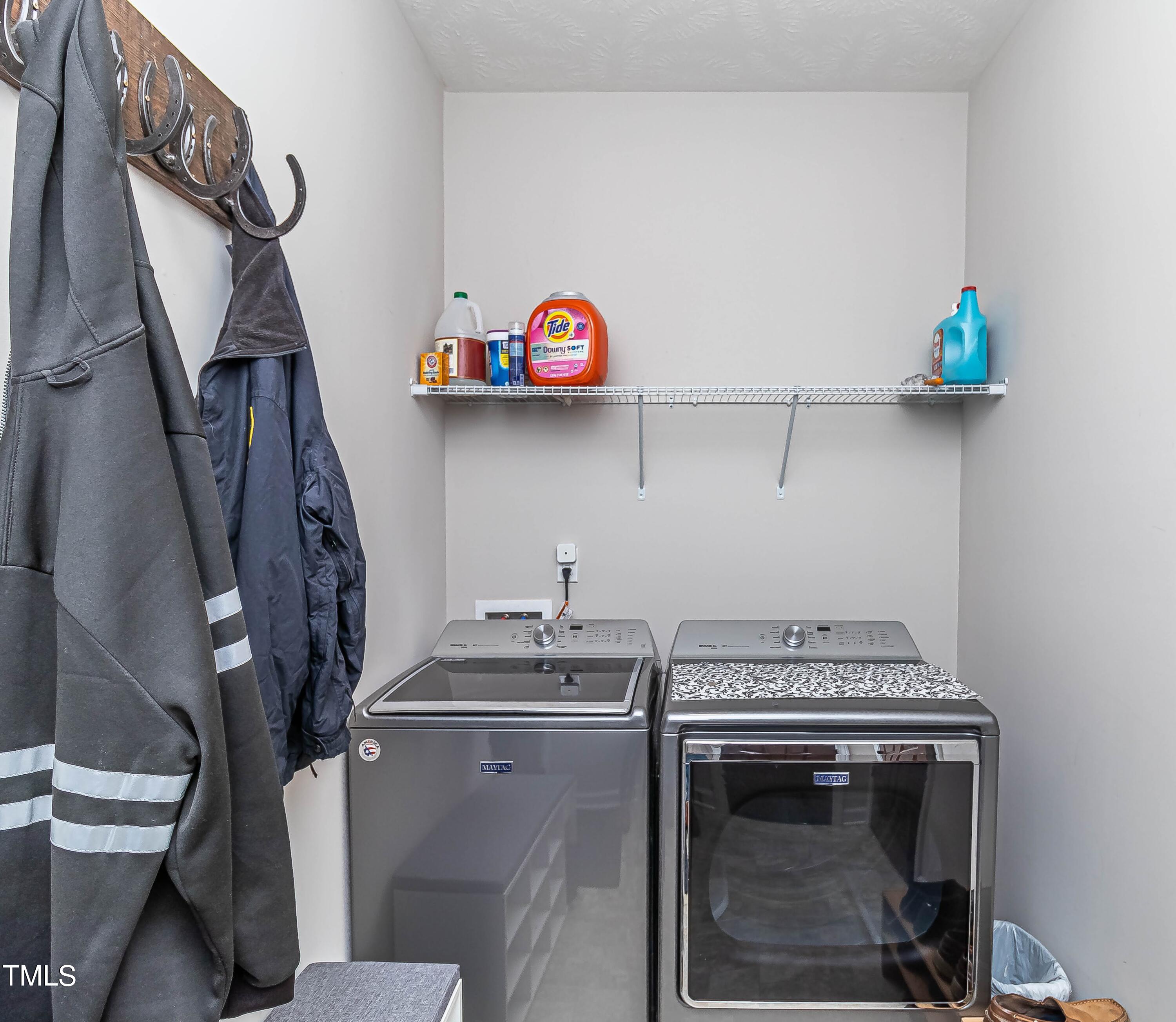 1852 Alderman Mill Road Dunn, NC 28334 - Photo 24 of 36 a utility room with sink dryer and washer