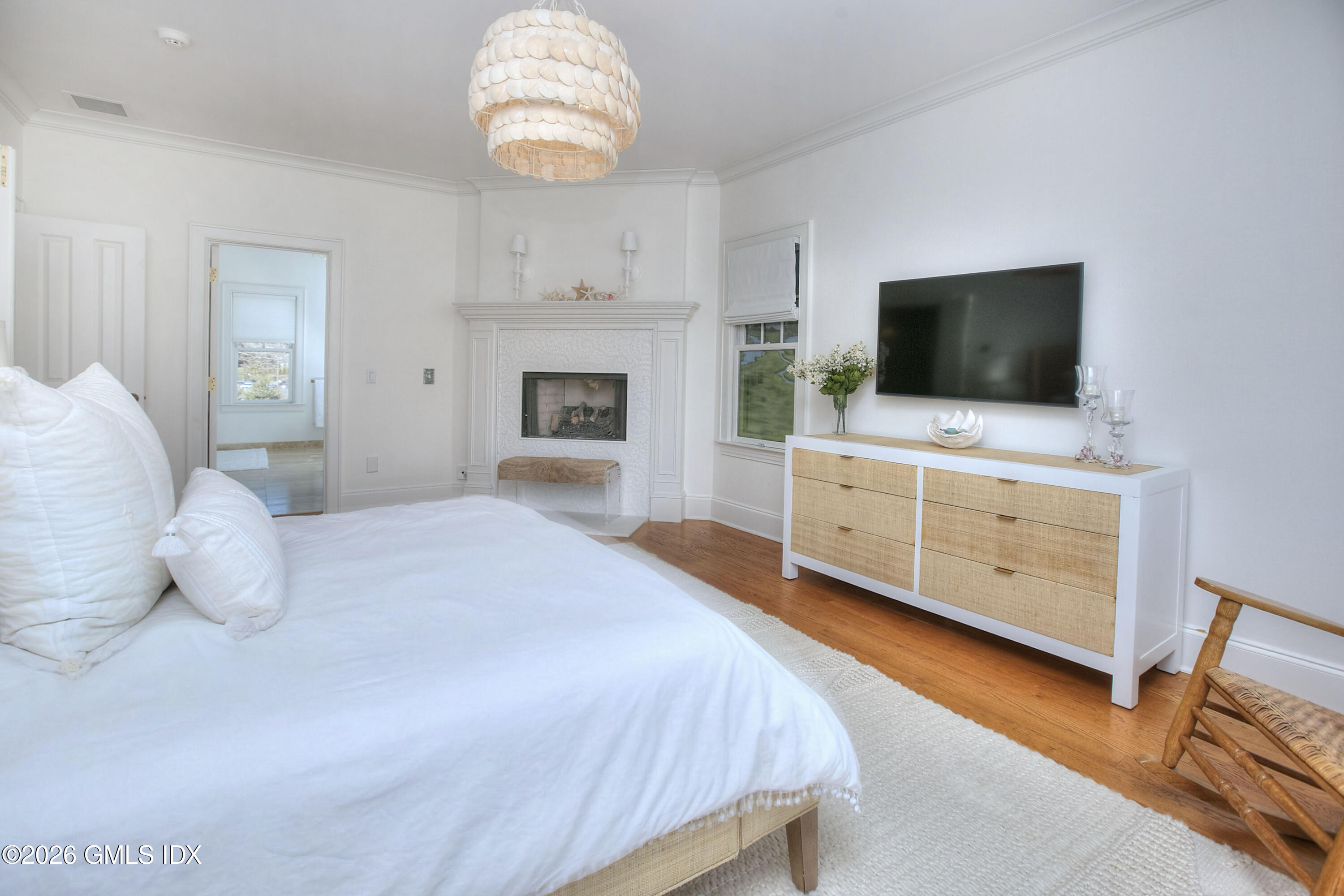 3 Shorehaven Road Norwalk, CT 06855 - Photo 24 of 40 a bedroom with furniture and a flat screen tv