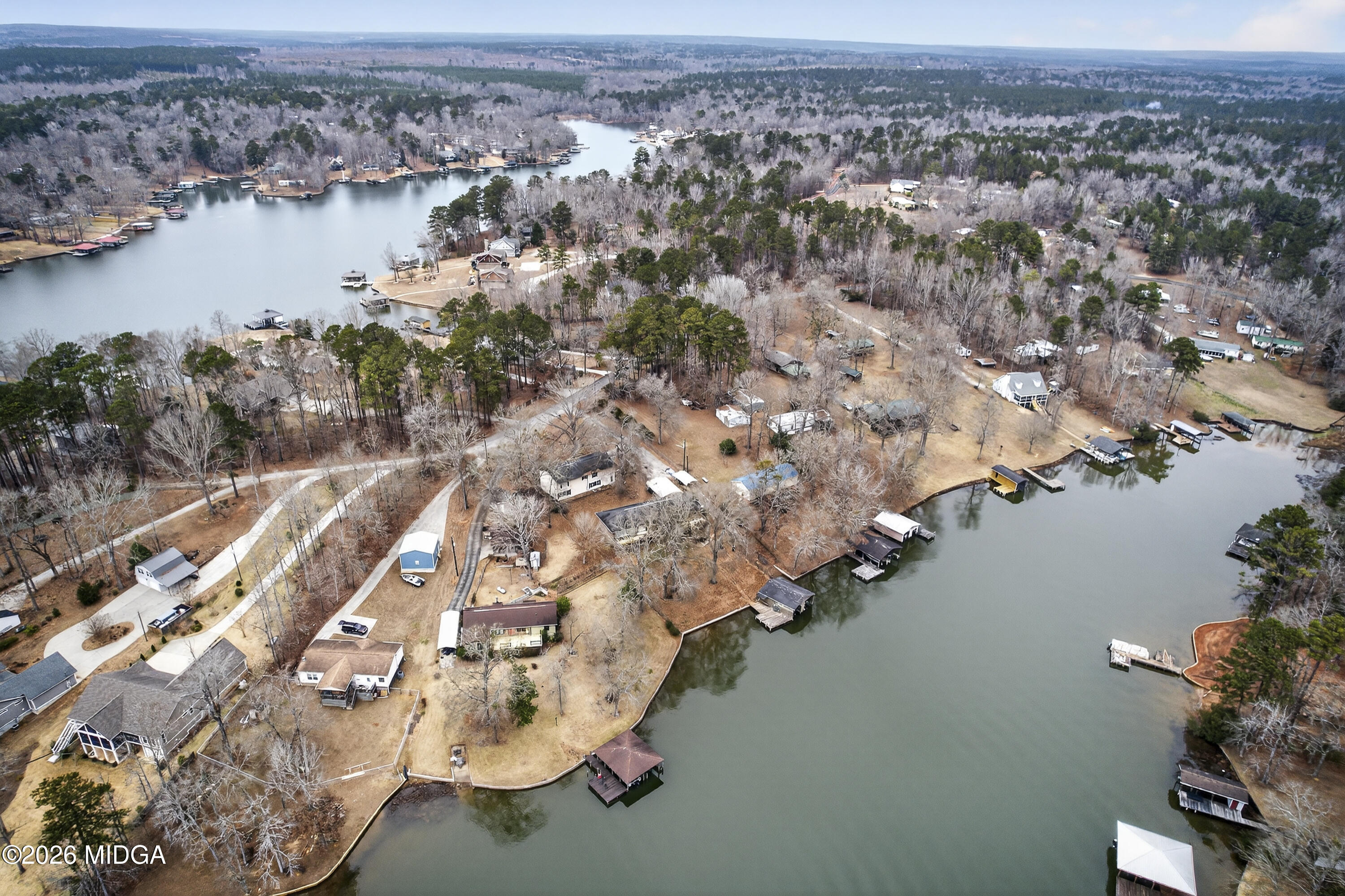 109 Cold Branch Lane Eatonton, GA 31024 - Photo 15 of 35 an aerial view of a house with a lake view