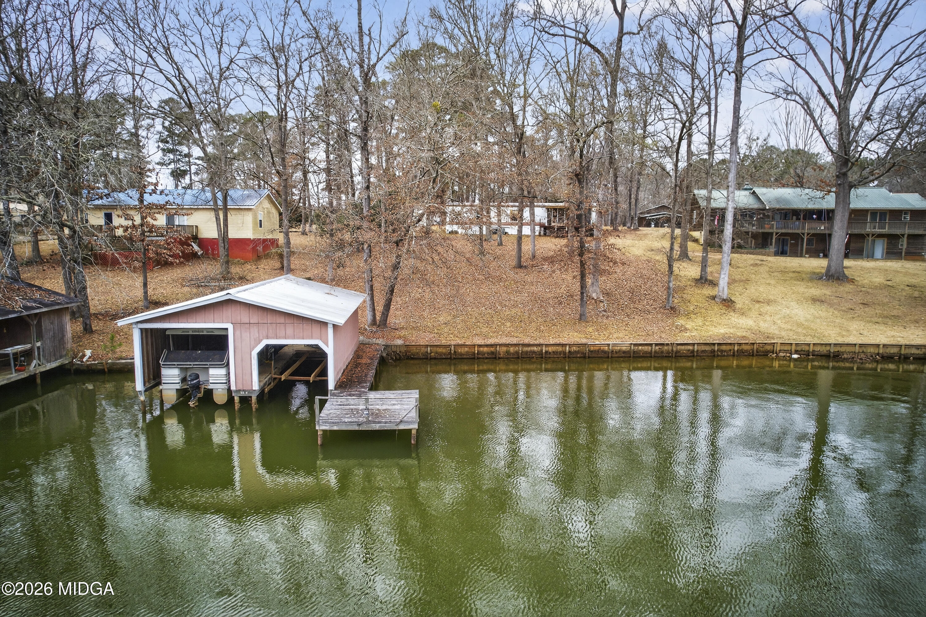109 Cold Branch Lane Eatonton, GA 31024 - Photo 3 of 35 a swimming pool with outdoor seating and yard