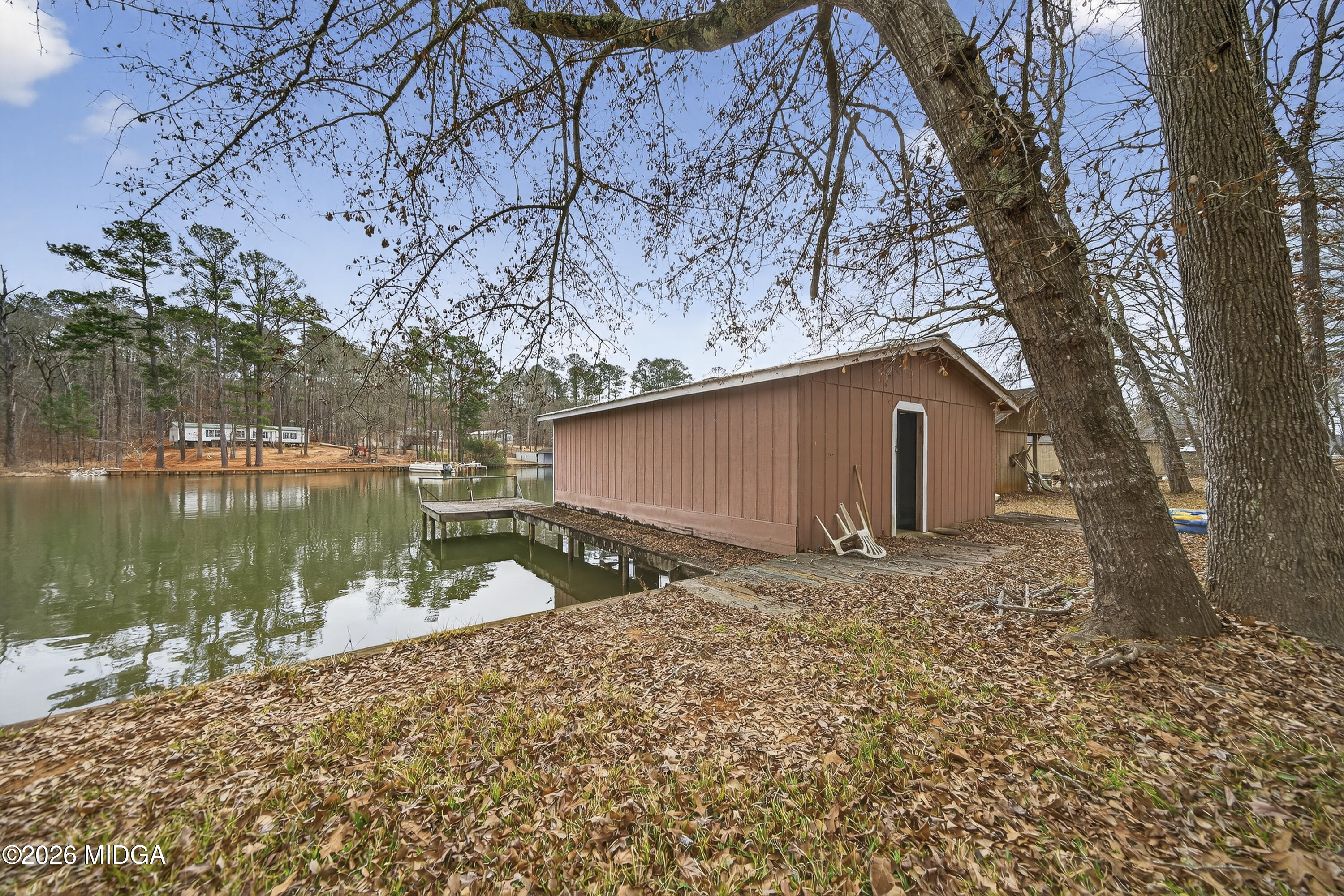 109 Cold Branch Lane Eatonton, GA 31024 - Photo 4 of 35 a backyard of a house with lots of green space
