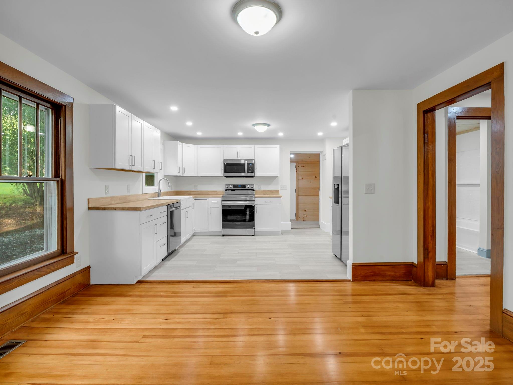 339 Flack Road Forest City, NC 28043 - Photo 21 of 32 a view of kitchen with wooden floor