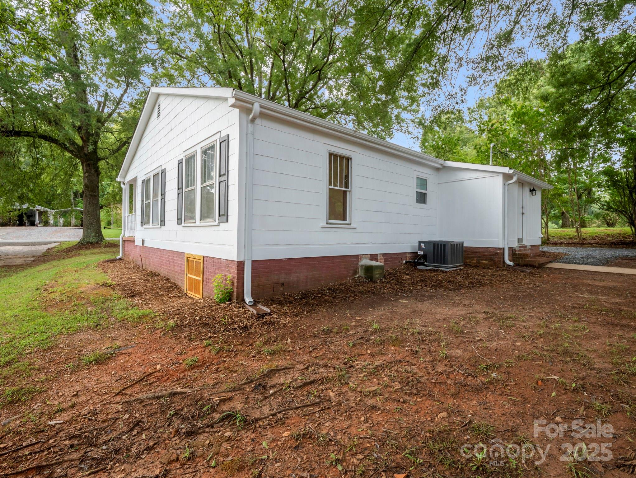 339 Flack Road Forest City, NC 28043 - Photo 30 of 32 a view of a house with backyard