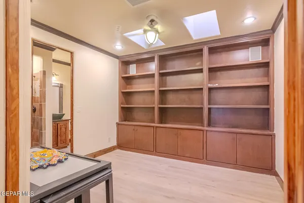 a view of kitchen with furniture and wooden floor
