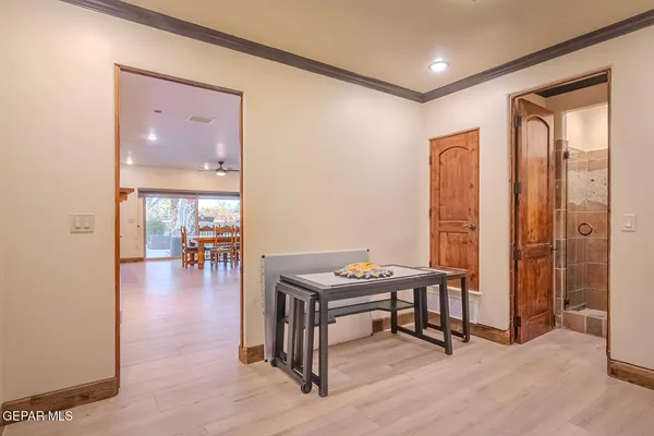 a bathroom with a granite countertop sink a toilet and a shower