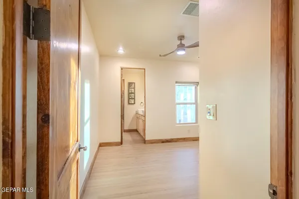 a bath tub sitting next to a window