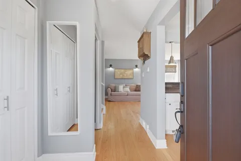 a view of a hallway with toilet