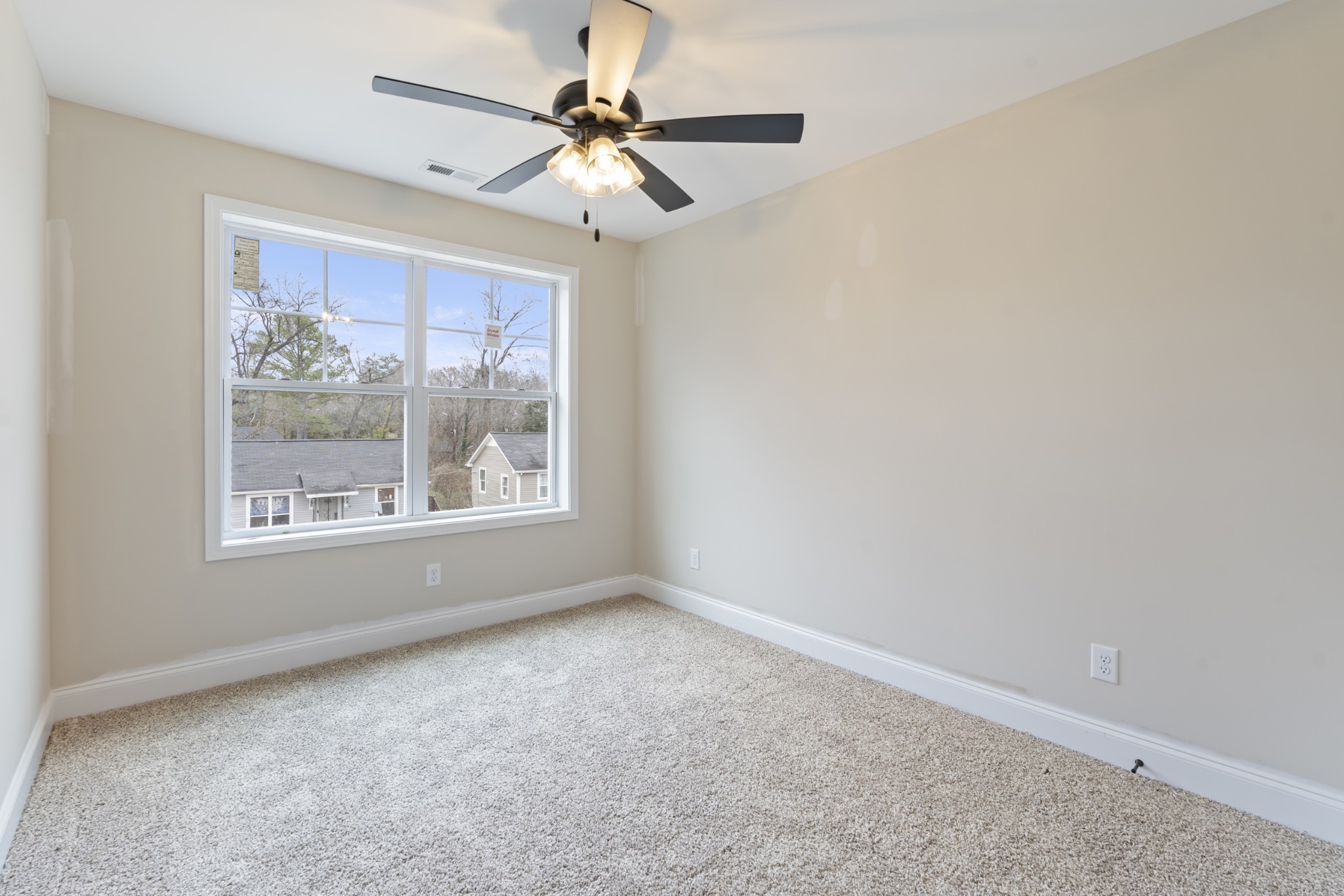 83 Charlotte Road Clarksville, TN 37040 - Photo 18 of 24 an empty room with a window