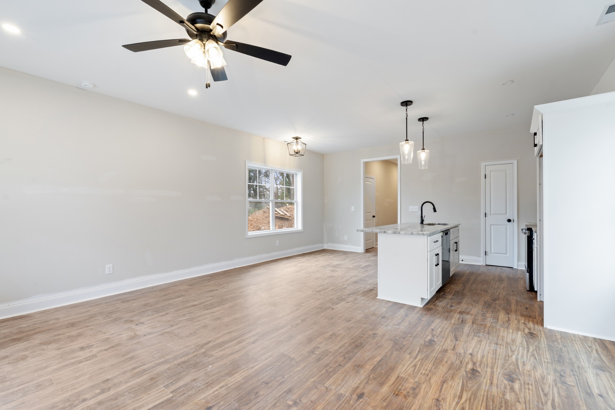 83 Charlotte Road Clarksville, TN 37040 - Photo 8 of 24 a view of a kitchen with a sink and a window