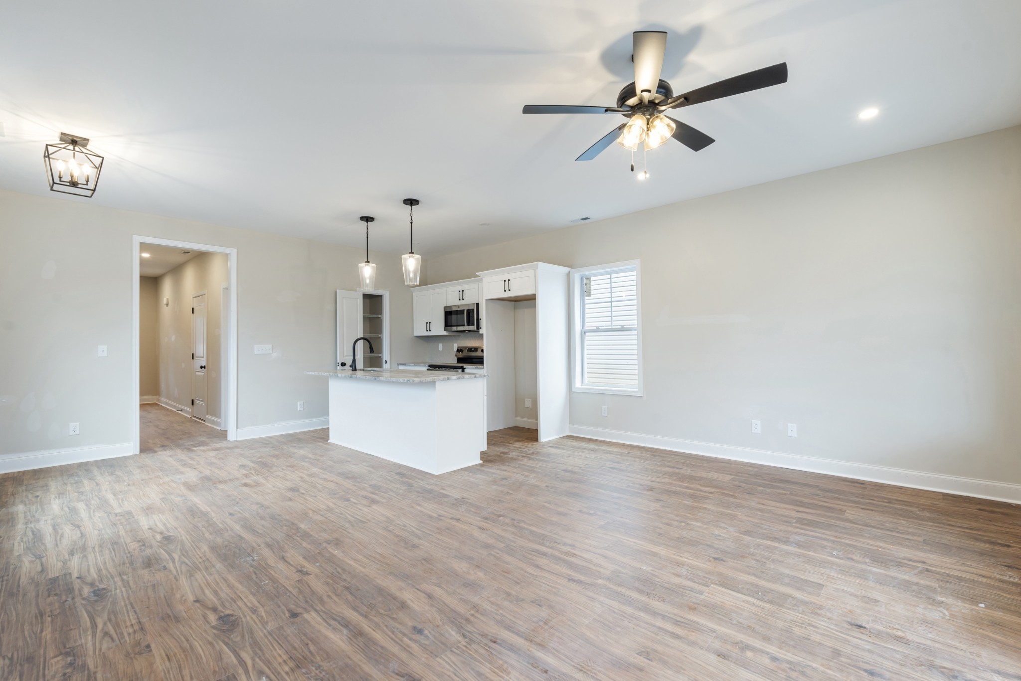 83 Charlotte Road Clarksville, TN 37040 - Photo 9 of 24 a view of kitchen with granite countertop cabinets and refrigerator