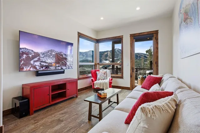 a view of a balcony with wooden floor
