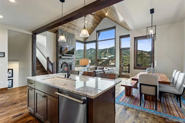 a view of a dining room with furniture window and outside view