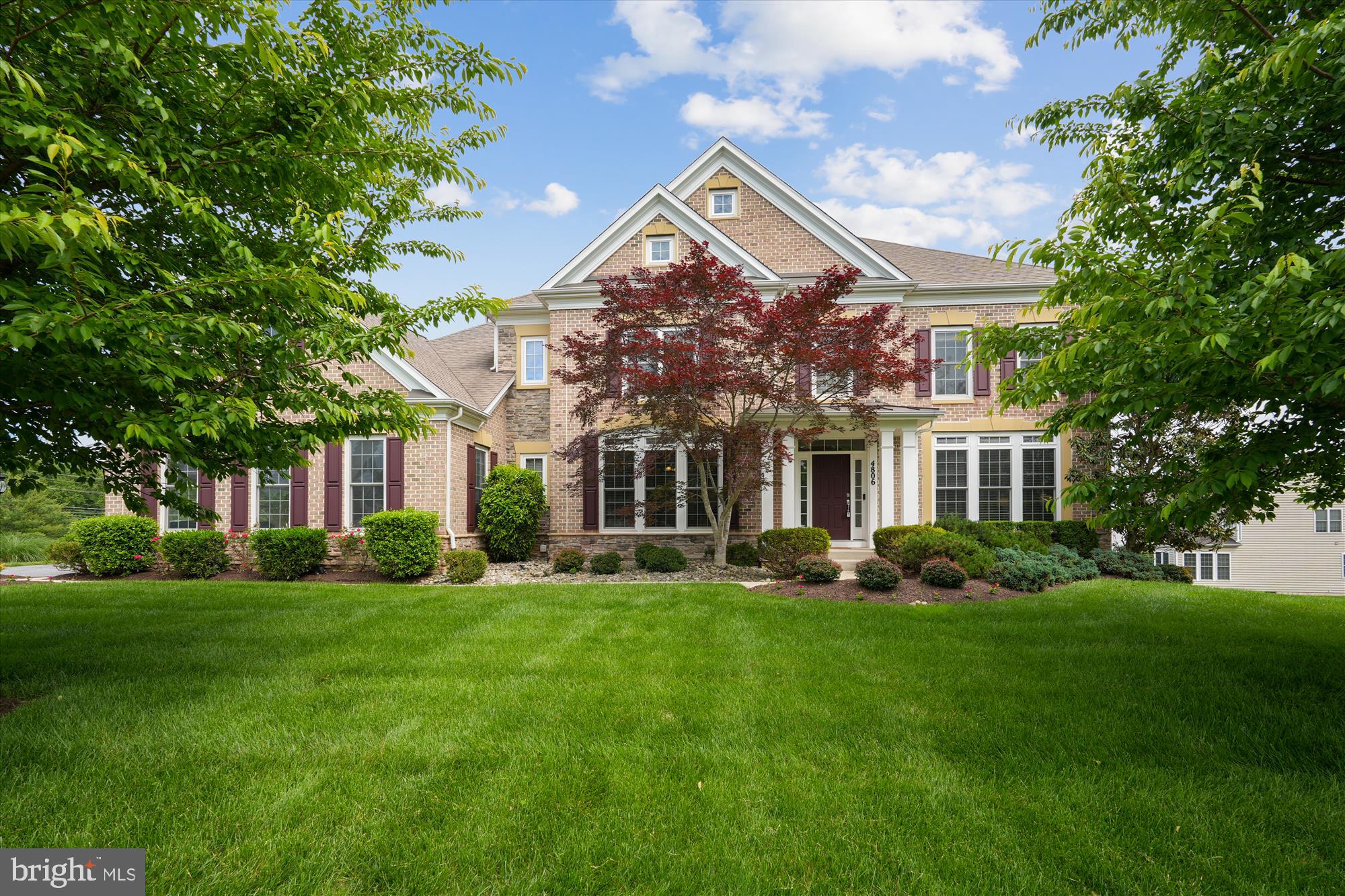 4806 Fair Hill Road Olney, MD 20832 - Photo 1 of 77 a front view of a building with a yard
