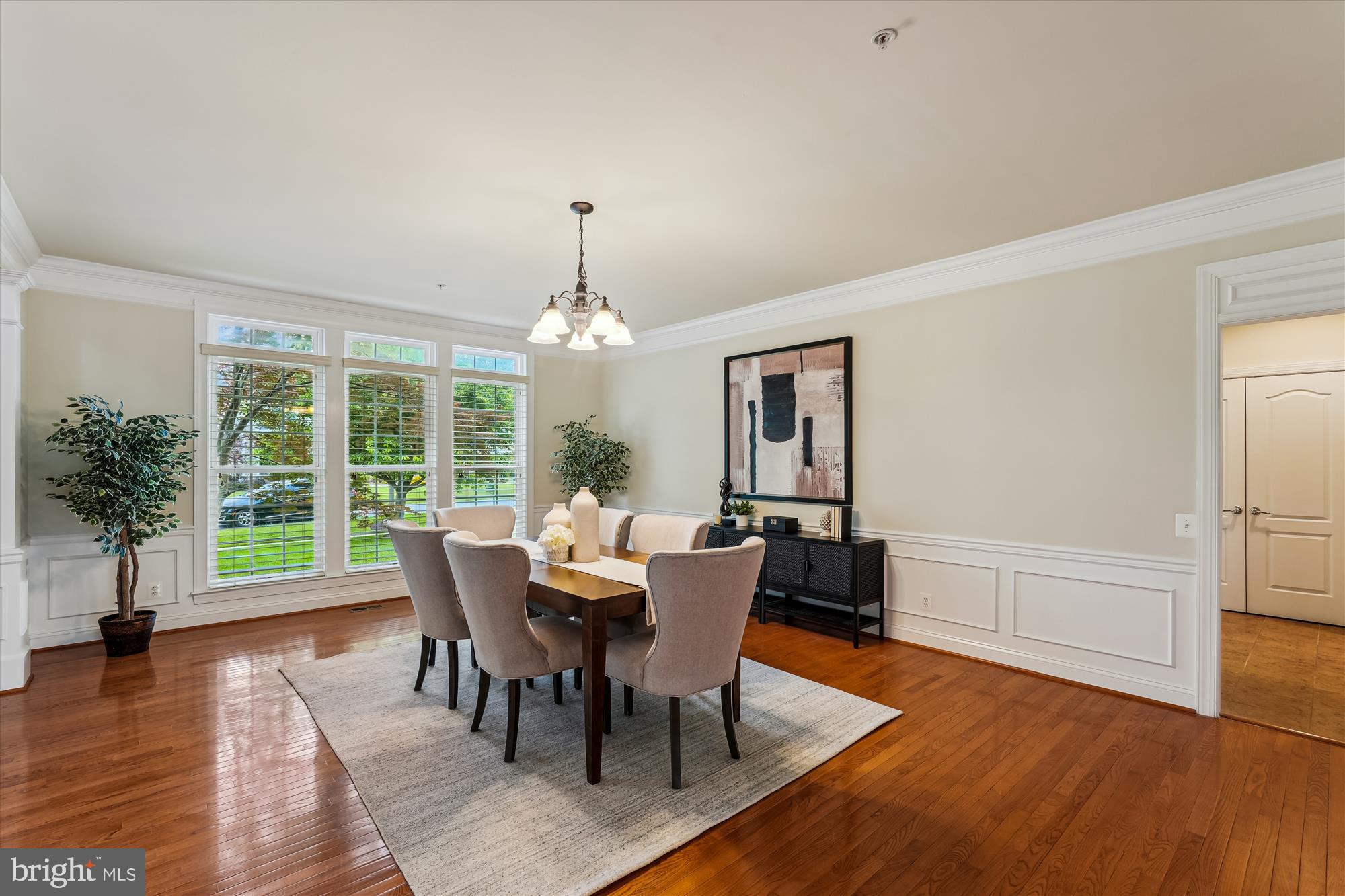 4806 Fair Hill Road Olney, MD 20832 - Photo 14 of 77 a view of a dining room with furniture window and wooden floor