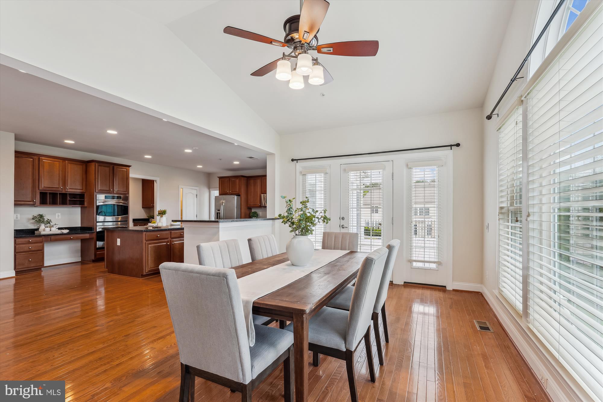 4806 Fair Hill Road Olney, MD 20832 - Photo 29 of 77 a view of a dining room with furniture window and wooden floor