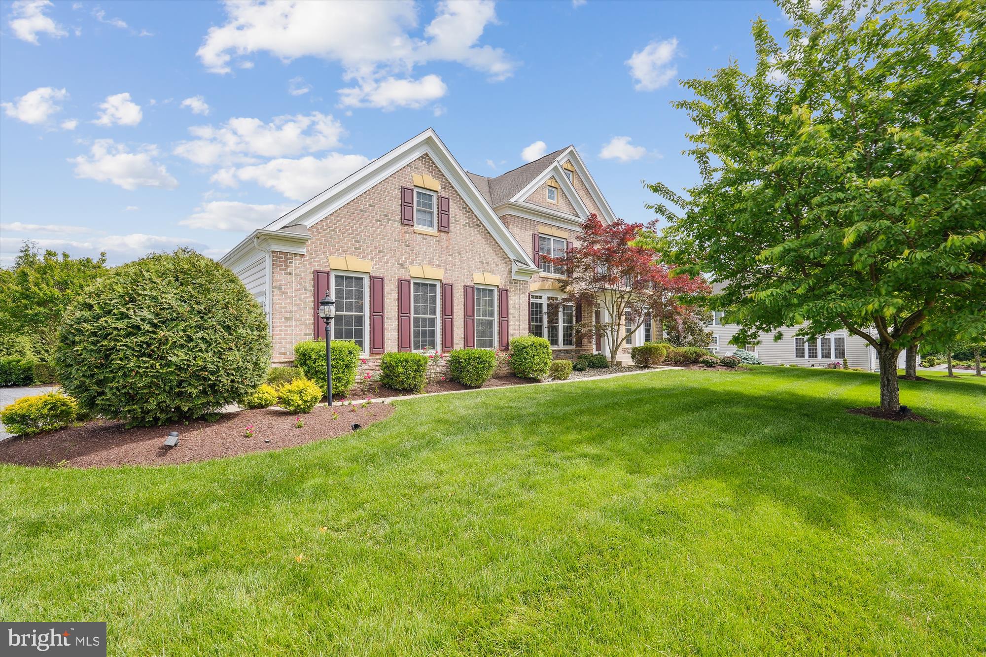 4806 Fair Hill Road Olney, MD 20832 - Photo 3 of 77 a front view of a house with a garden