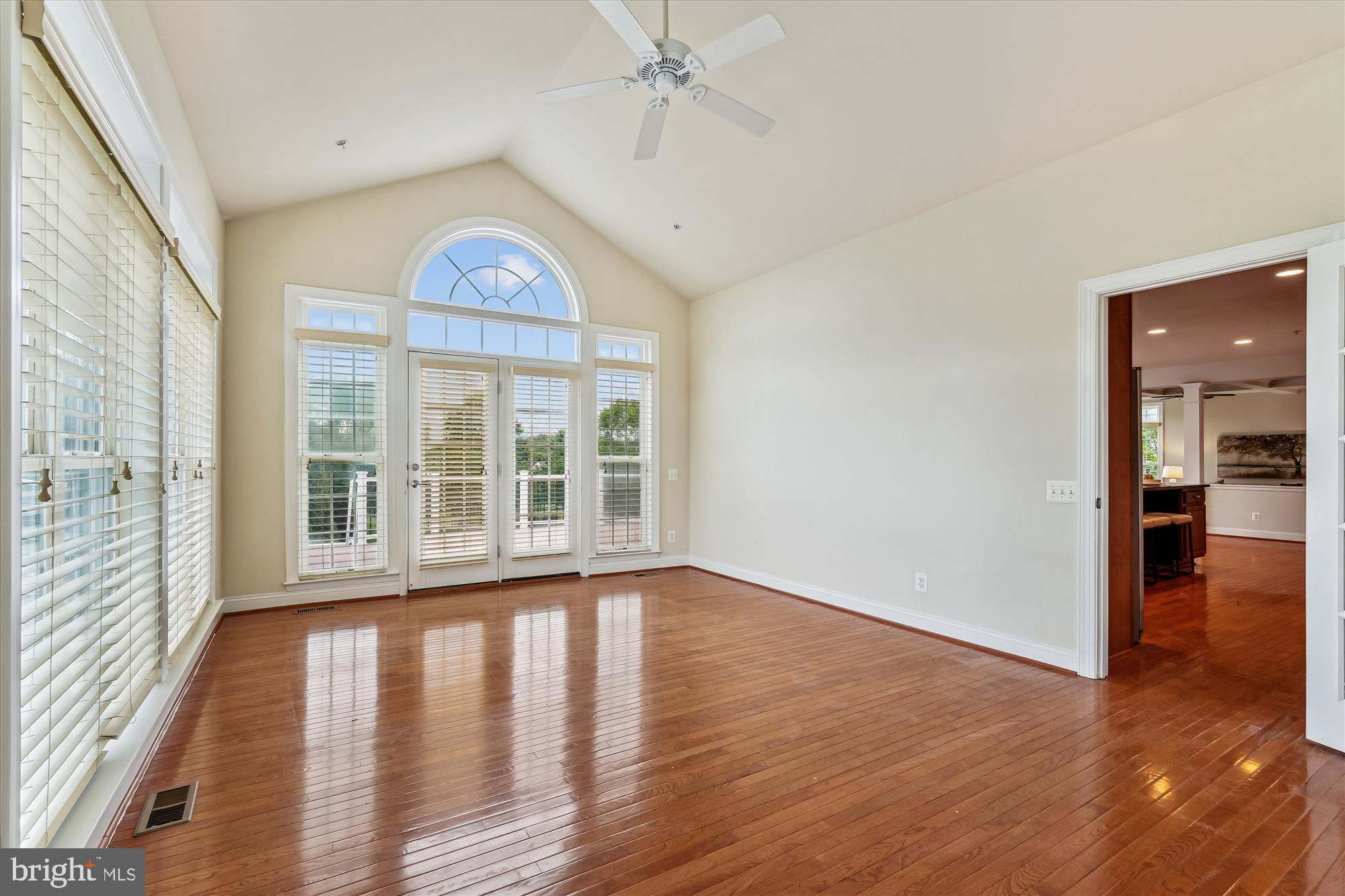 4806 Fair Hill Road Olney, MD 20832 - Photo 31 of 77 wooden floor in an empty room with a window