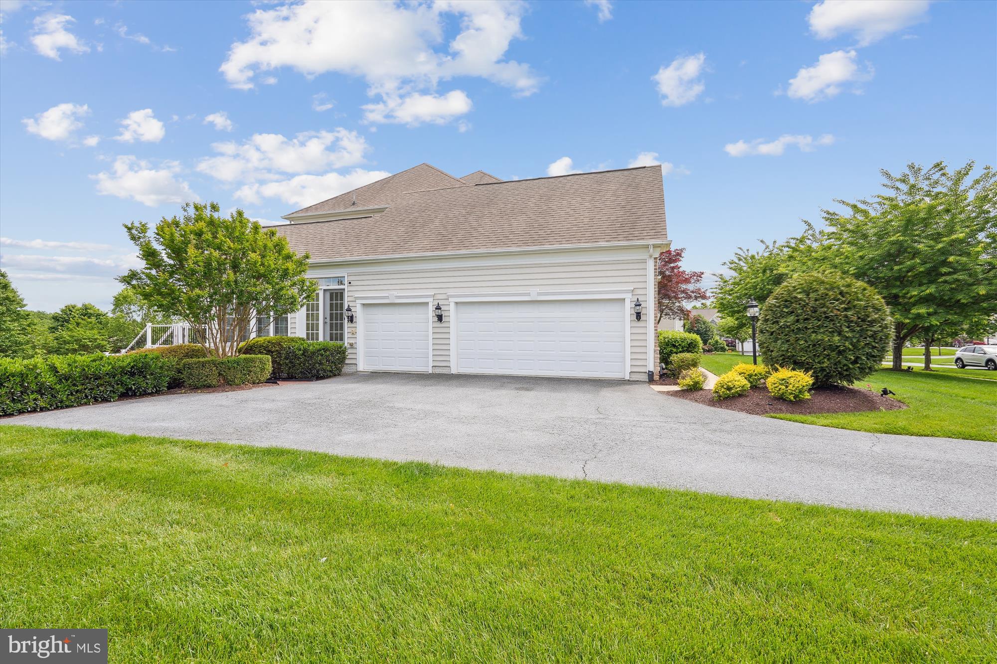 4806 Fair Hill Road Olney, MD 20832 - Photo 5 of 77 a front view of a house with a yard and garage