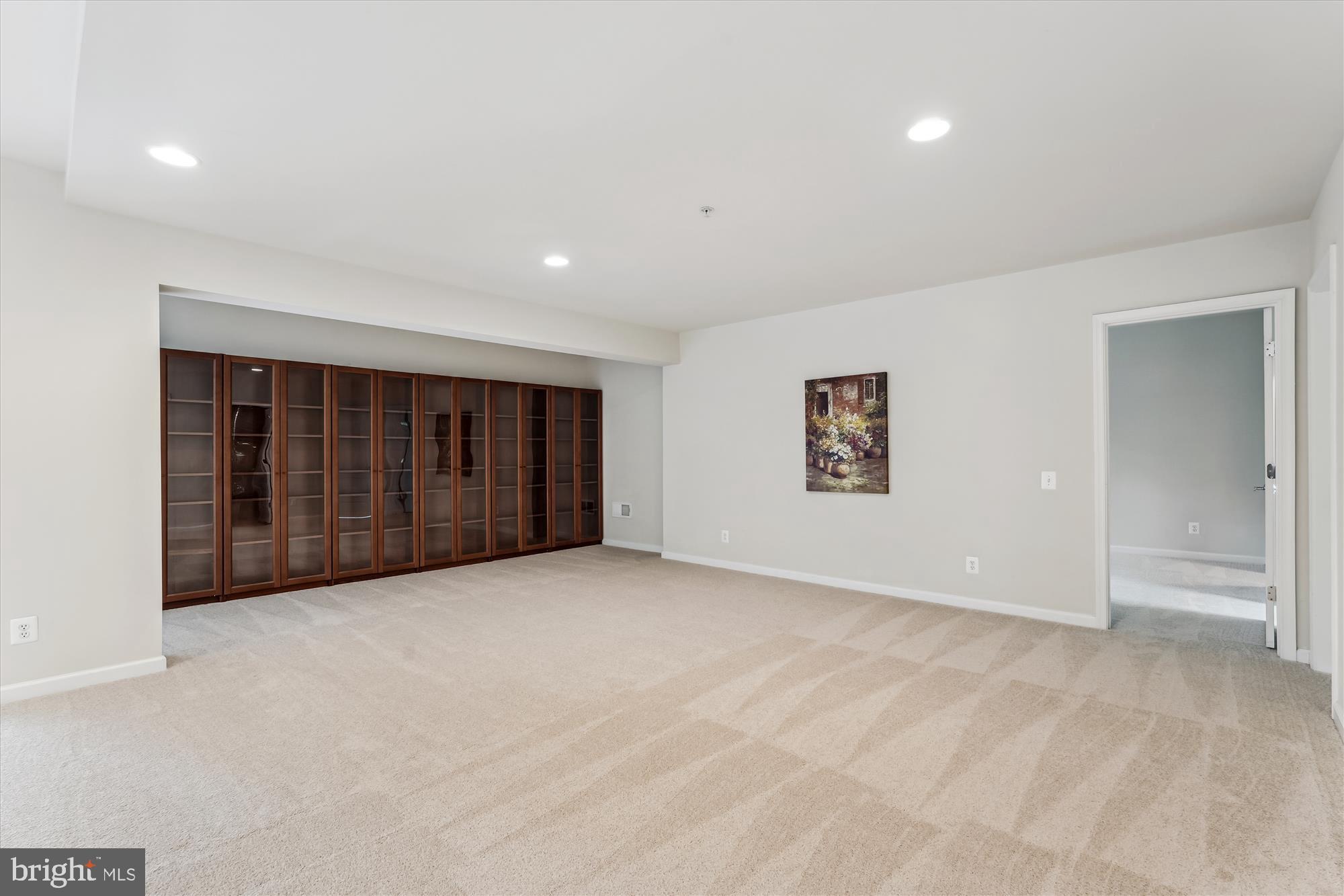 4806 Fair Hill Road Olney, MD 20832 - Photo 64 of 77 an empty room with a hallway