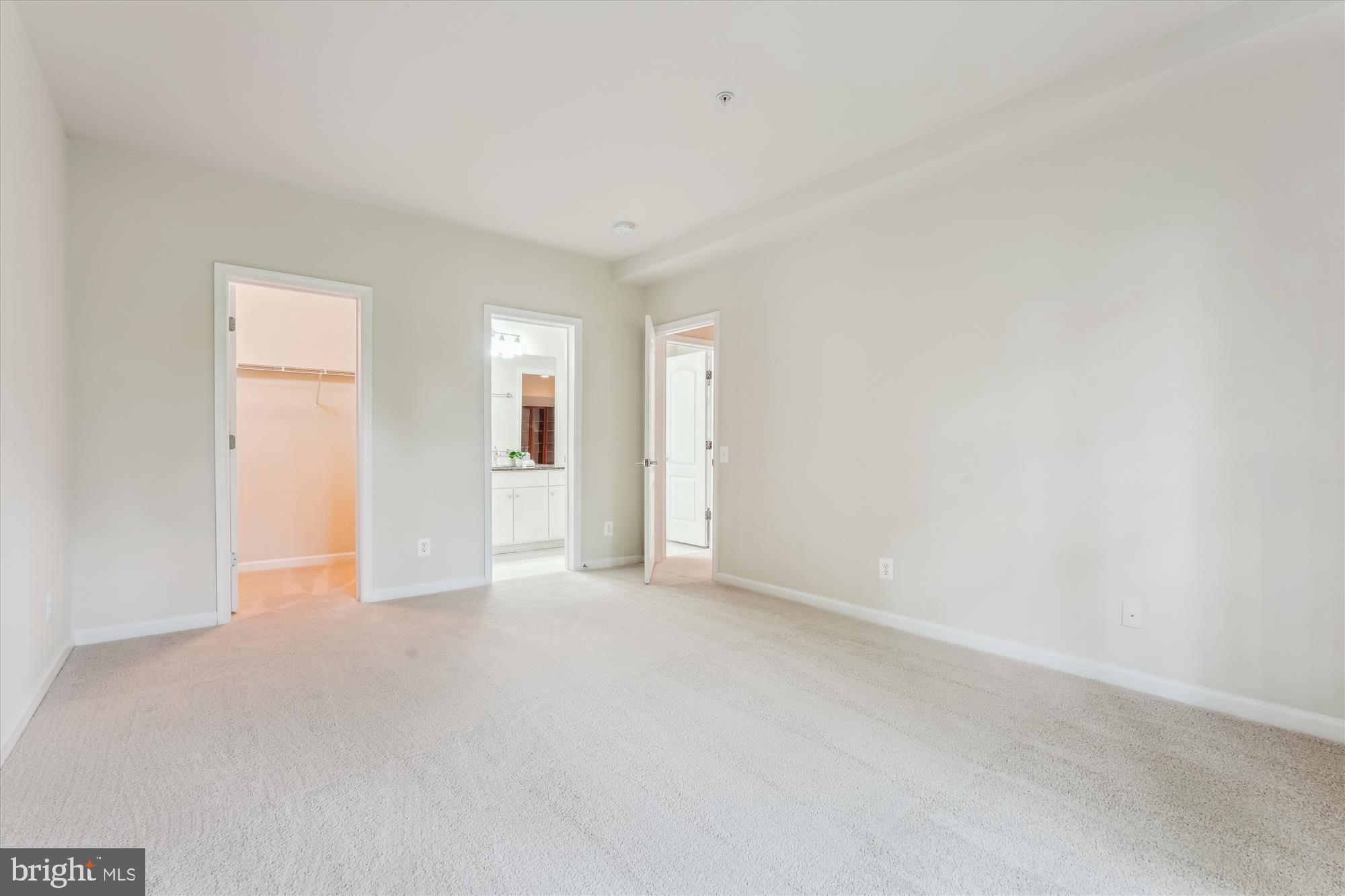 4806 Fair Hill Road Olney, MD 20832 - Photo 67 of 77 a view of an empty room with wooden floor and a window