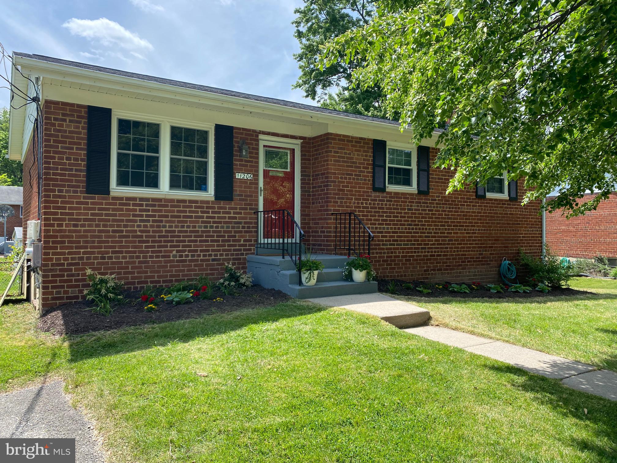 11206 Rock Road Rockville, MD 20852 - Photo 1 of 37 Larger model home with covered front entry.