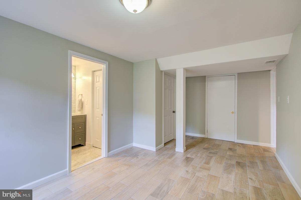 11206 Rock Road Rockville, MD 20852 - Photo 31 of 37 Wood look laminate flooring.